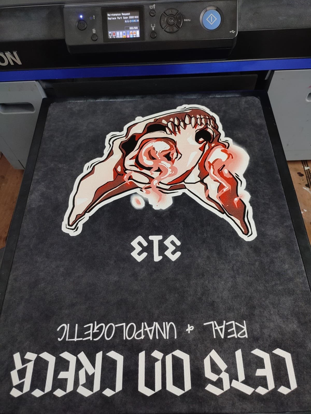 Finished custom T-shirt showcasing DTG printing and professional finishing